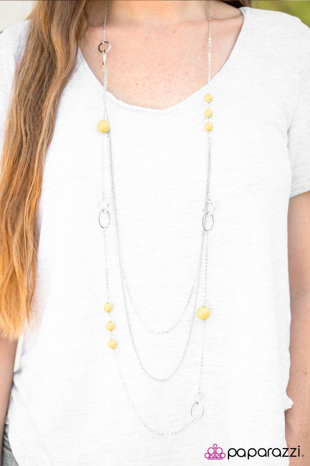 Paparazzi Accessories Absolutely Lit - Yellow Polished yellow beads trickle along a shimmery silver chain. Infused with silver accents, two more chains are added to the colorful palette for a whimsically layered finish. Features an adjustable clasp closur
