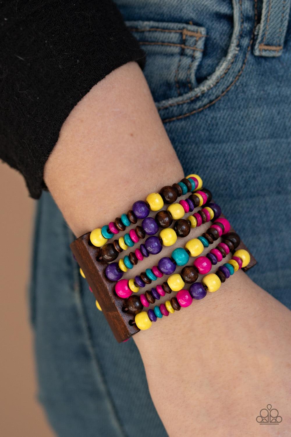 Paparazzi Accessories Don’t Stop BELIZE-ing - Multi Rectangular wooden frames hold together a collection of multicolored wooden beads threaded along stretchy bands, coalescing into a summery display around the wrist. Jewelry