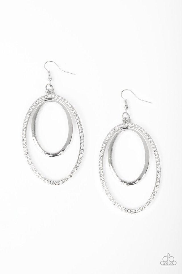 Paparazzi Accessories Wrapped in Wealth - White A glistening silver hoop swings from the top of a larger silver hoop radiating with glassy white rhinestones for a refined look. Earring attaches to a standard fishhook fitting. Jewelry