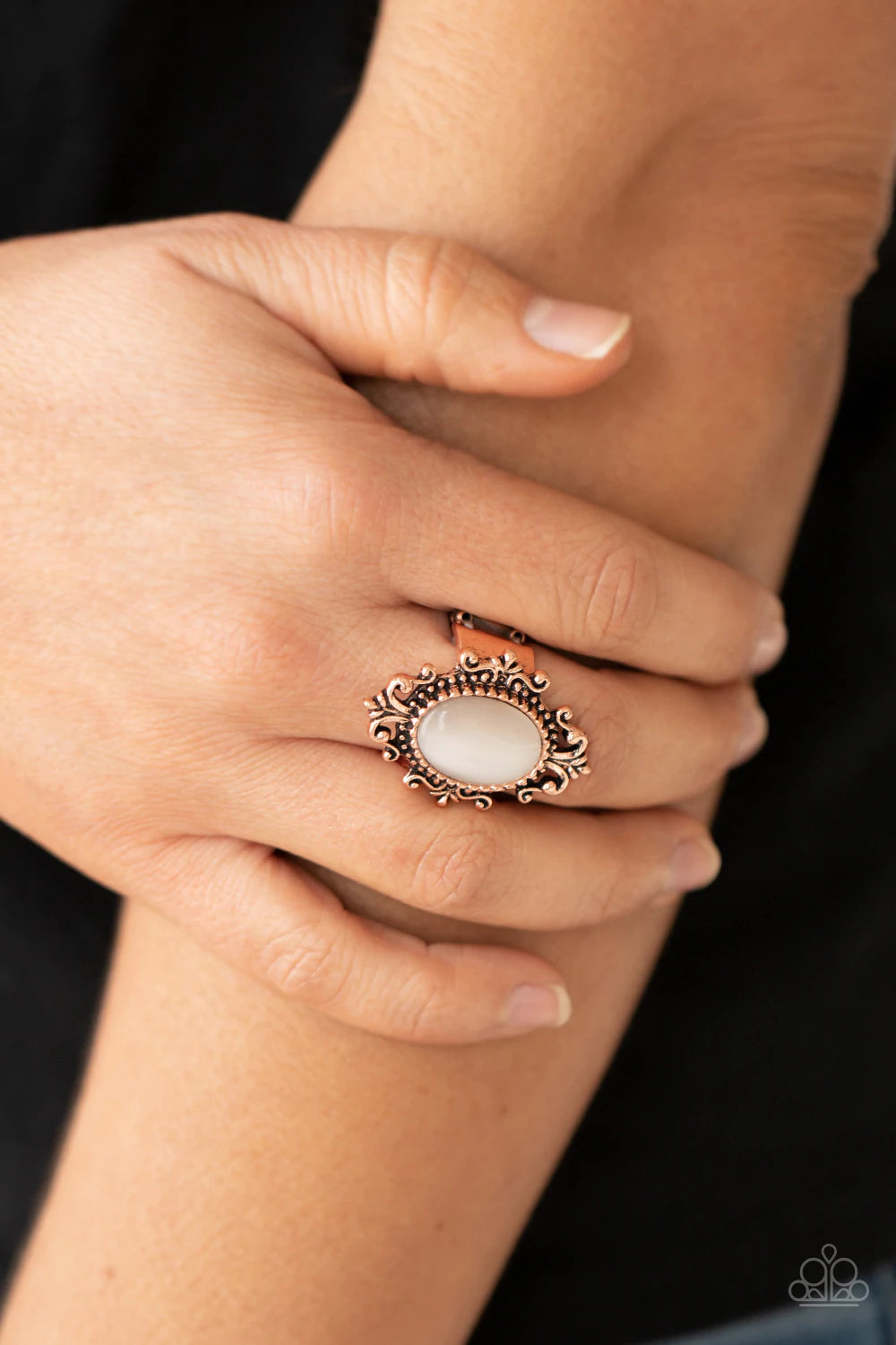 Paparazzi Accessories Can You SEER What I SEER - Copper A glowing cat's eye stone is pressed into the center of an ornately studded copper frame, creating a mystical pop of color atop the finger. Features a stretchy band for a flexible fit. Sold as one in