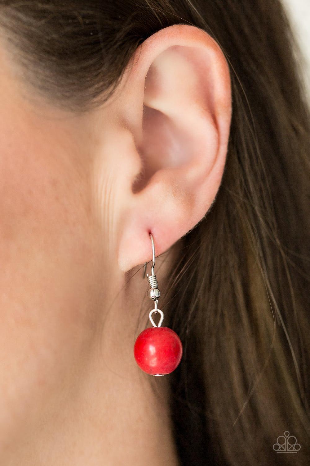 Paparazzi Accessories Second Nature - Red Etched in shimmery textures, a chunky silver chain gives way to a collection of fiery red stones and hammered silver accents. Each featuring patterns derived from nature, the glistening discs join into a layered a