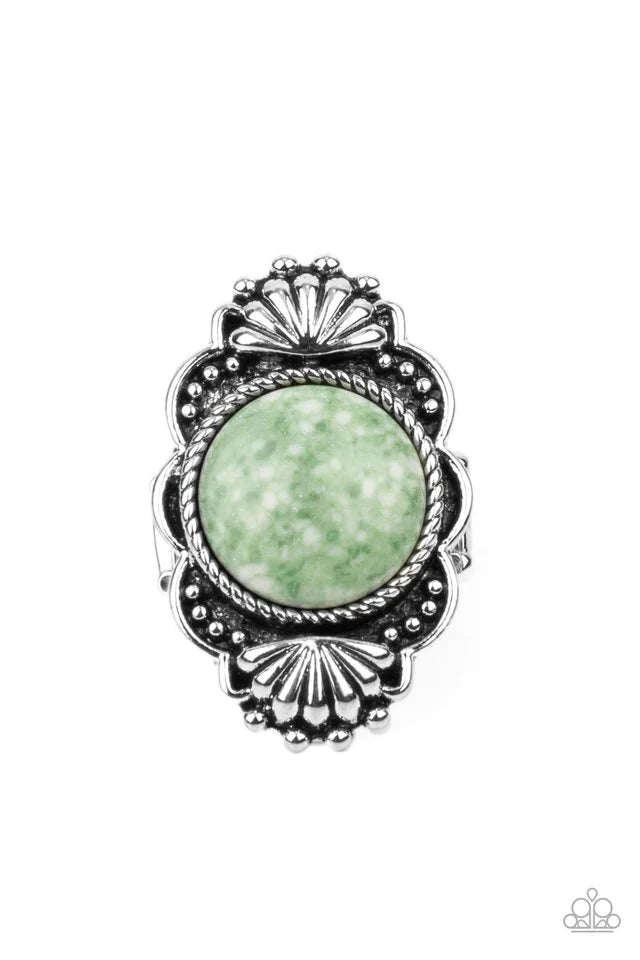 Paparazzi Accessories Atlantis Adventure - Green Adorned in silver seashells and dainty silver studs, the center of a scalloped silver frame is dotted with an oversized green stone for an artisan inspired finish. Features a stretchy band for a flexible fi