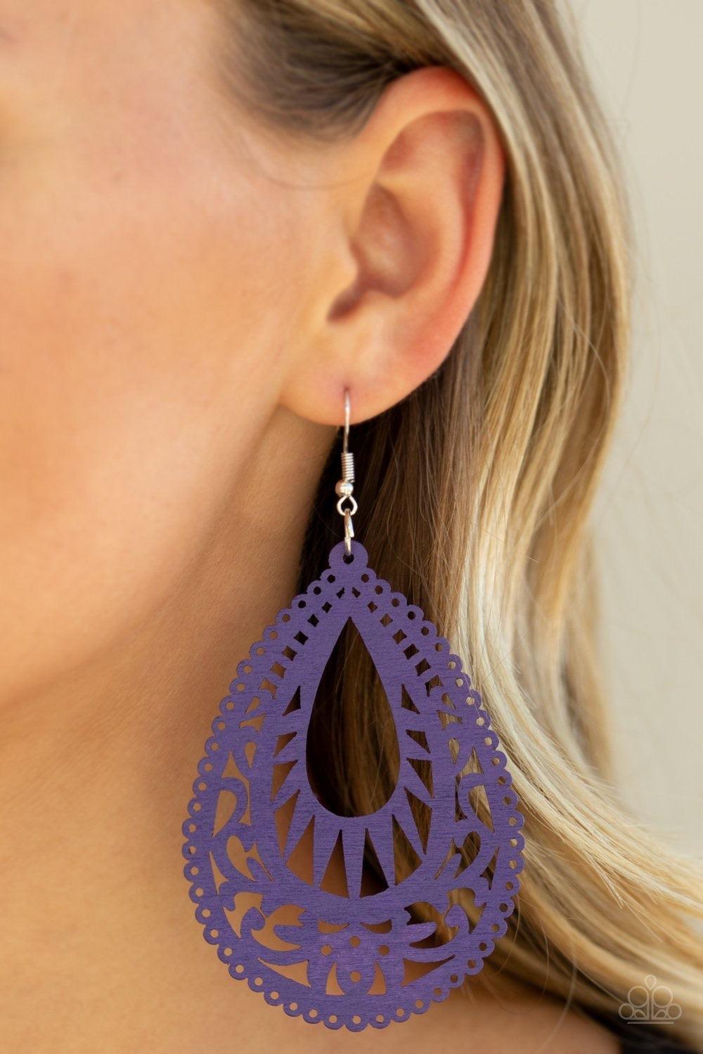 Paparazzi Accessories Zesty Zen - Purple Painted in a vivacious purple finish, an airy wooden frame swirling with filigree detail swings from the ear for a seasonal look. Earring attaches to a standard fishhook fitting. Jewelry