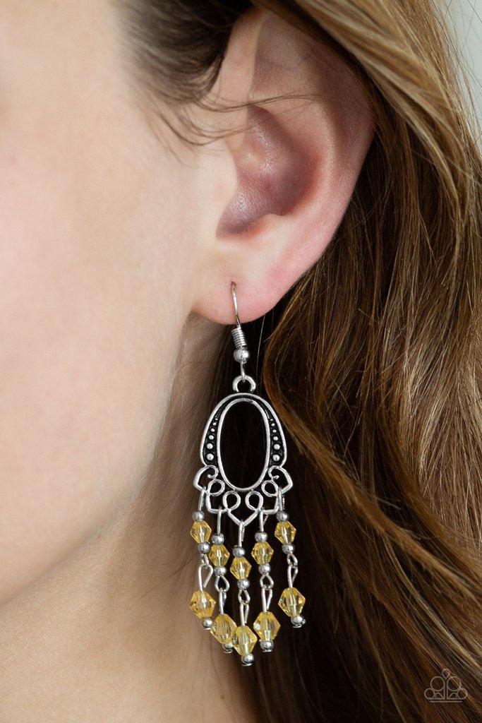 Paparazzi Accessories Not The Only Fish In The Sea - Yellow Glassy yellow beads cascade from the bottom of an ornate silver frame, creating a whimsical chandelier. Earring attaches to a standard fishhook fitting. Jewelry
