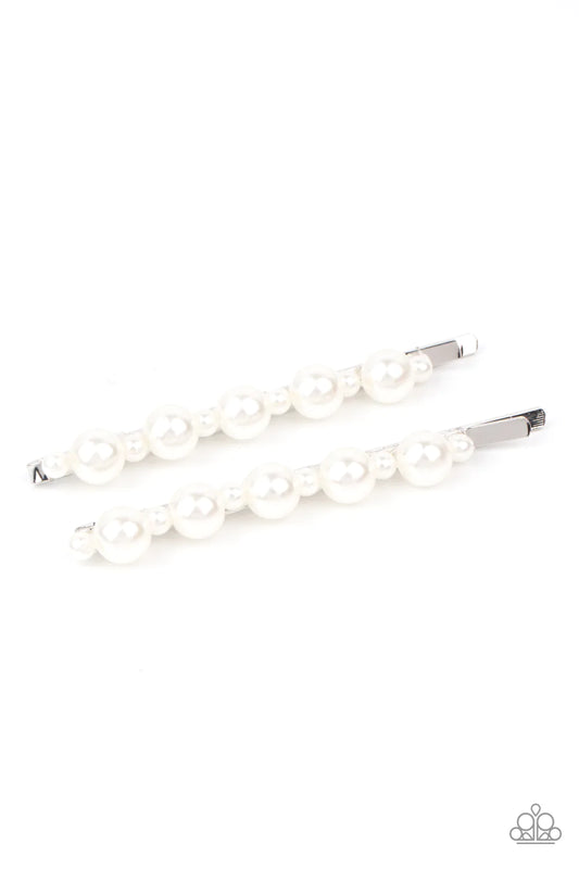 Paparazzi Accessories Put a Pin In It - White Dainty and classic pearls alternate along a pair of silver bobby pins, creating a bubbly display. Sold as one pair of decorative bobby pins. Hair Accessories