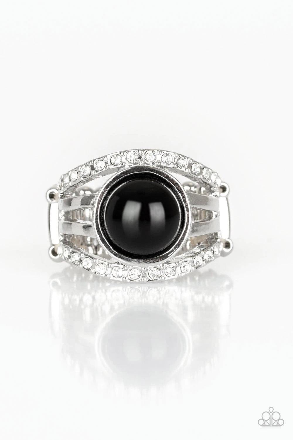 Paparazzi Accessories A Big Break - Black Radiating with glassy white rhinestones, row after row of glittering silver bars arc across the finger. A shiny black bead is pressed into the center of the layered bands, adding a dramatically refined finish to t
