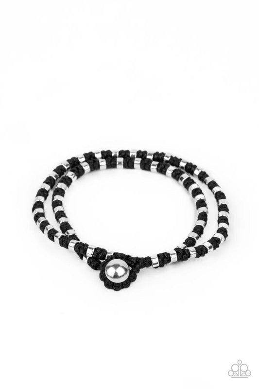 Paparazzi Accessories Ripcord - Black Dainty silver rings adorn a knotted black cord that double wraps around the wrist, creating edgy layers. Features a button loop closure. Sold as one individual bracelet. Jewelry