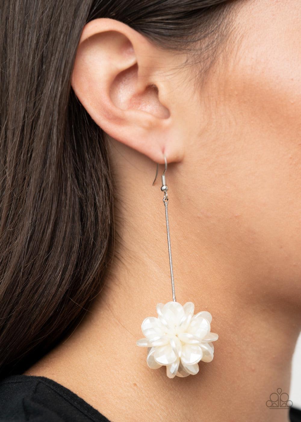 Paparazzi Accessories Swing Big - White Featuring faceted surfaces, pearly white teardrop beads delicately cluster at the bottom of a dainty silver chain for an elegant look. Earring attaches to a standard fishhook fitting. Sold as one pair of earrings. J