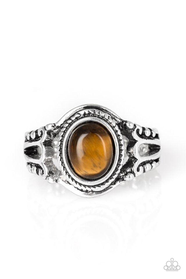 Paparazzi Accessories Peacefully Peaceful - Brown A tranquil tiger's eye stone is pressed into the center of a studded silver band for a seasonal look. Features a dainty stretchy band for a flexible fit. Jewelry