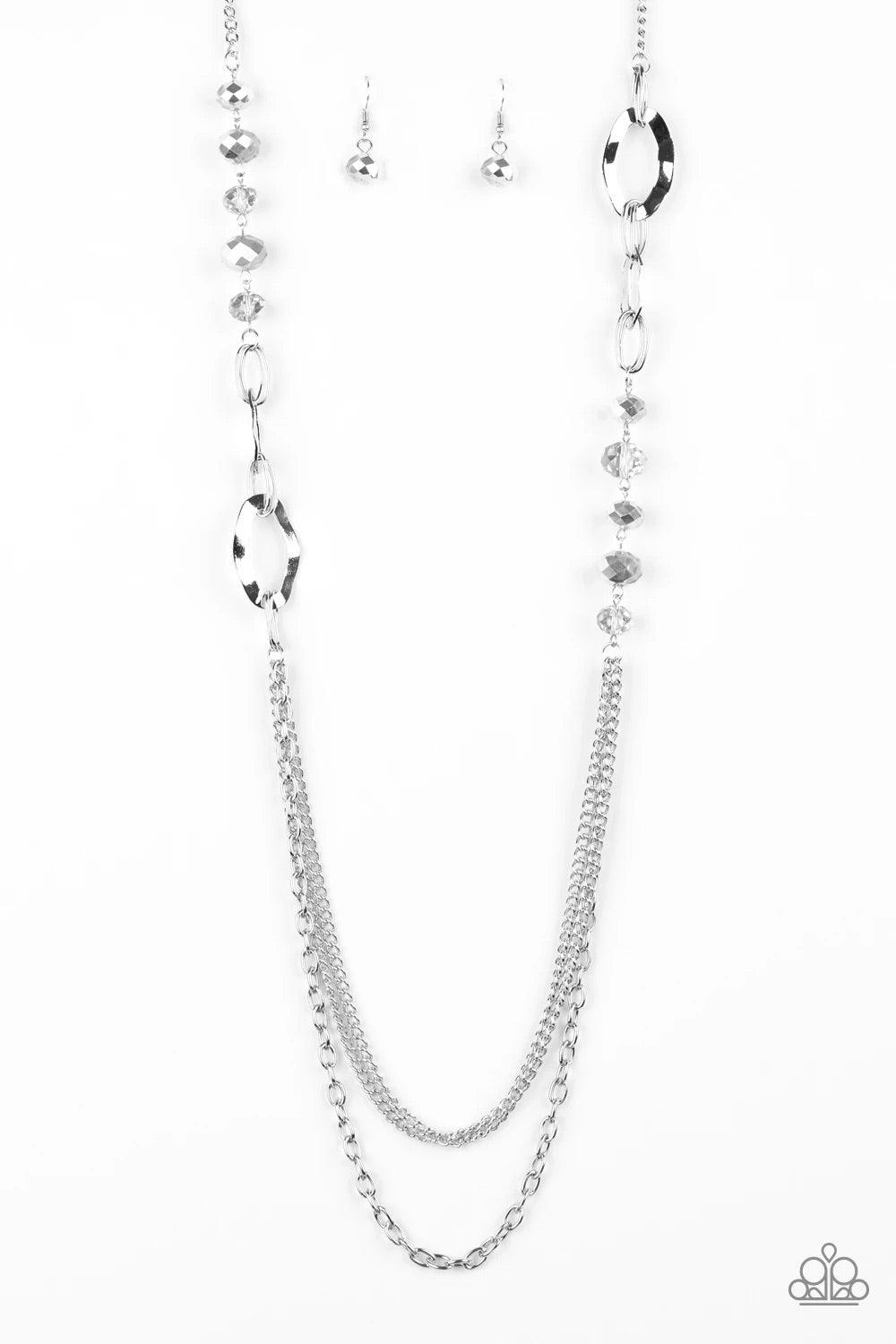 Paparazzi Accessories Modern Girl Glam - Silver Dipped in metallic shimmer, a collection of smoky crystal-like beads and hammered silver frames give way to layers of mismatched silver chains for a modern look. Features an adjustable clasp closure. Sold as