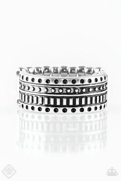 Paparazzi Accessories Roughin It - Silver Dotted and studded in tribal inspired patterns, an antiqued silver band arcs across the finger in a handcrafted, artisan inspired fashion. Features a stretchy band for a flexible fit. Jewelry