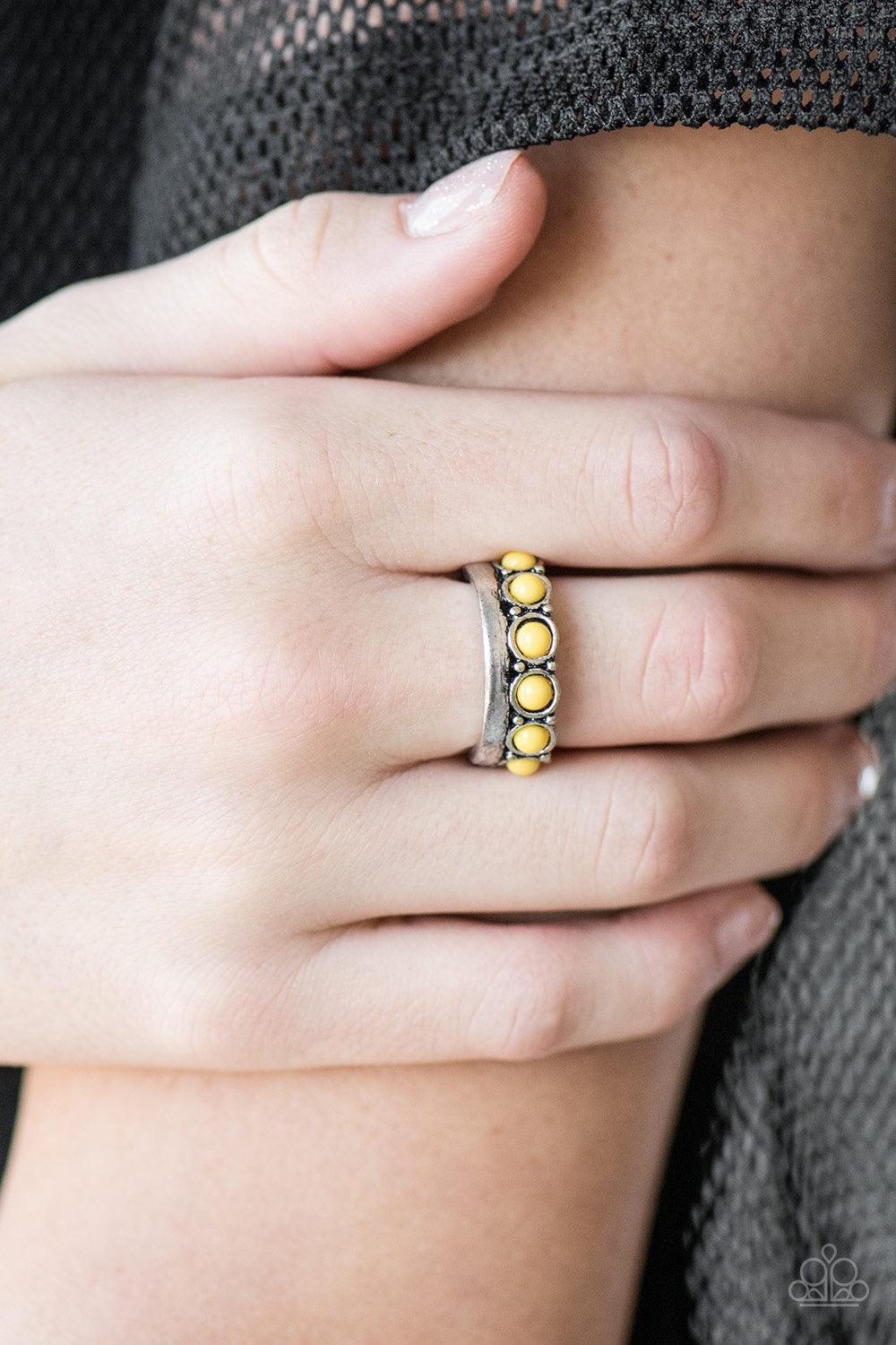 Paparazzi Accessories Country Couture - Yellow Sunny yellow beads are pressed into a dainty silver band for a rustic look. Features a dainty stretchy band for a flexible fit. Jewelry