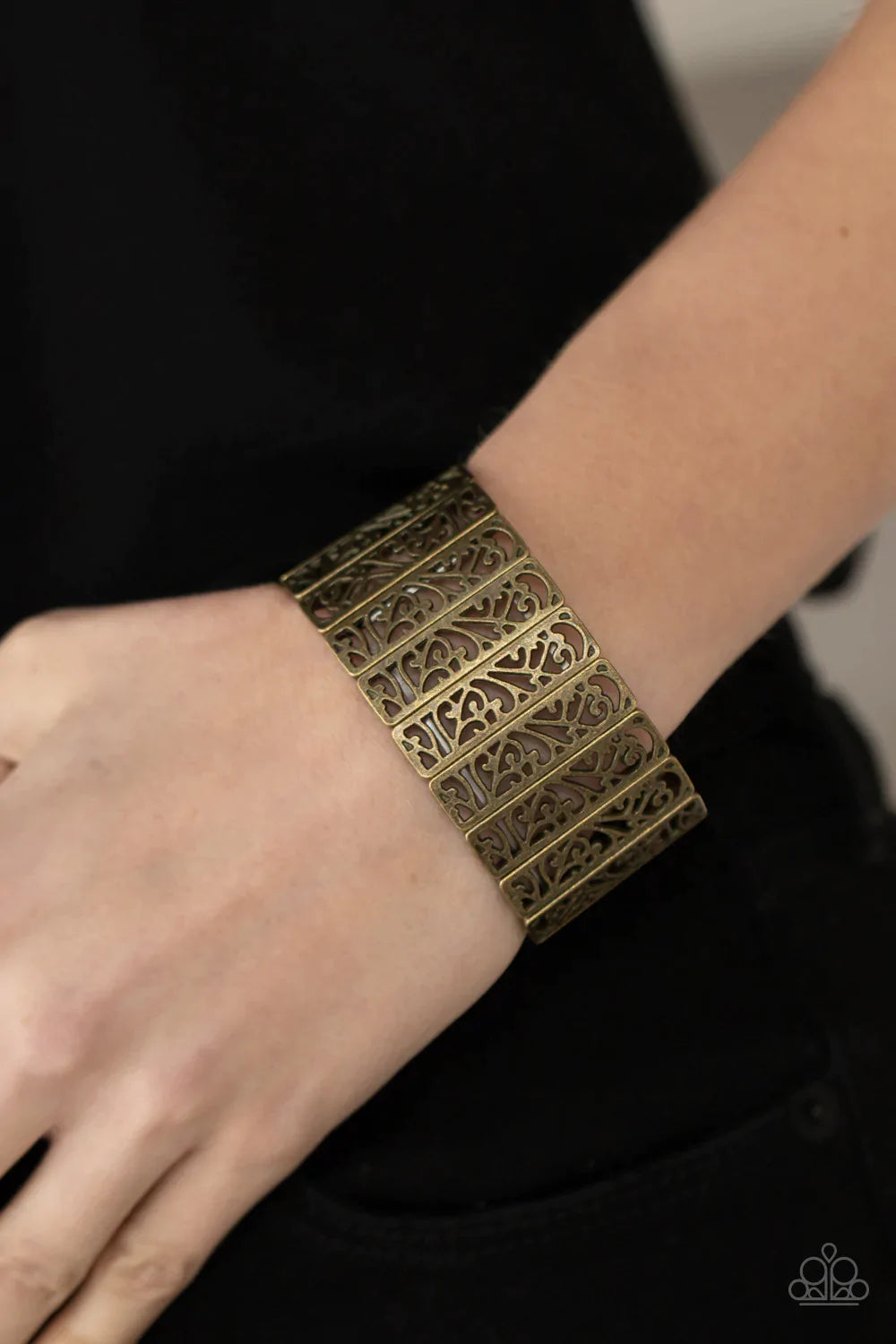 Paparazzi Accessories Ornate Orchards - Brass Filled with vine-like filigree centers, dainty brass rectangular frames are threaded along stretchy bands around the wrist for a seasonal inspired fashion. Sold as one individual bracelet.