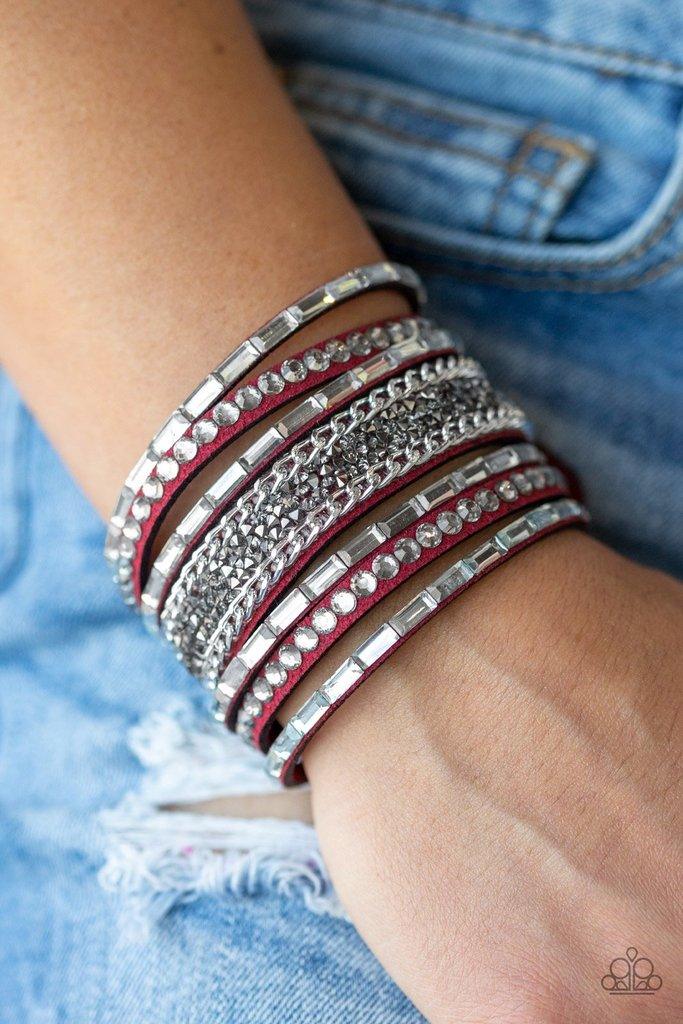 Paparazzi Accessories Rhinestone Rumble - Red White emerald-cut rhinestones, smoky round rhinestones, and metallic prism-shaped rhinestones are sprinkled along strands of red suede. Shimmery silver chain is added to the mix for a sassy industrial finish.