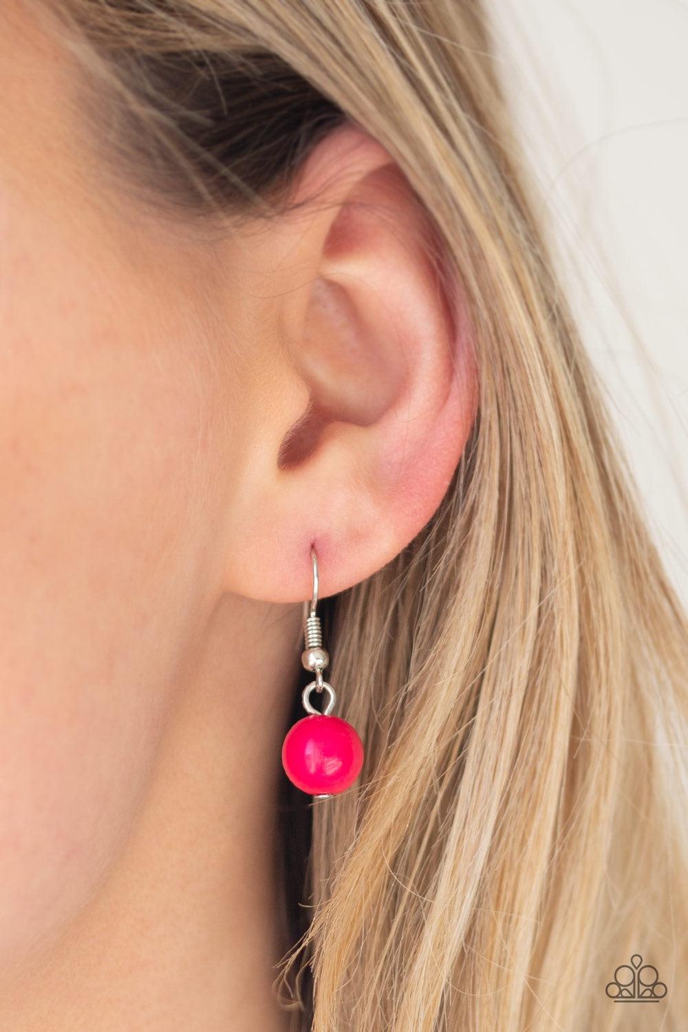 Paparazzi Accessories Dream Pop - Pink Gradually increasing in size near the center, a collection of pink and silver beads layer below the collar in a statement making fashion. Features an adjustable clasp closure. Jewelry