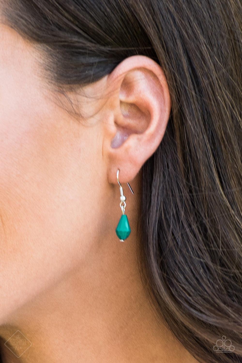 Paparazzi Accessories Modern Macarena - Green Featuring round and teardrop shapes, clusters of faceted Quetzal Green beads swing from the bottom of a shimmery silver chain, creating a playful fringe below the collar. Features an adjustable clasp closure.