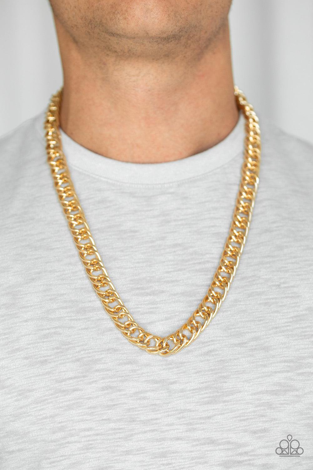 Paparazzi Accessories Omega - Gold Featuring double links, an oversized gold beveled cable chain drapes across the chest for a sleek, upscale look. Features an adjustable clasp closure. Jewelry