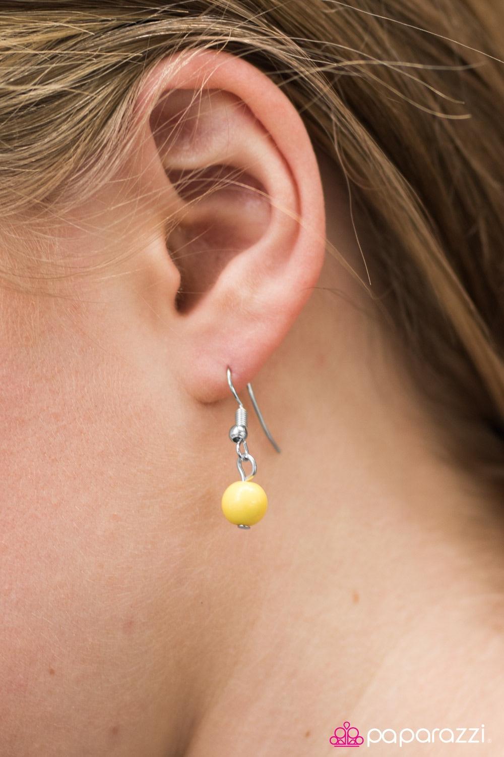 Paparazzi Accessories Finally FRAME-ous - Yellow Sunny yellow and classic silver beading cascade from two rows of bold silver chain. Glistening silver frames trickle between the colorful fringe, adding a trendy geometric flair to the flawlessly layered pa