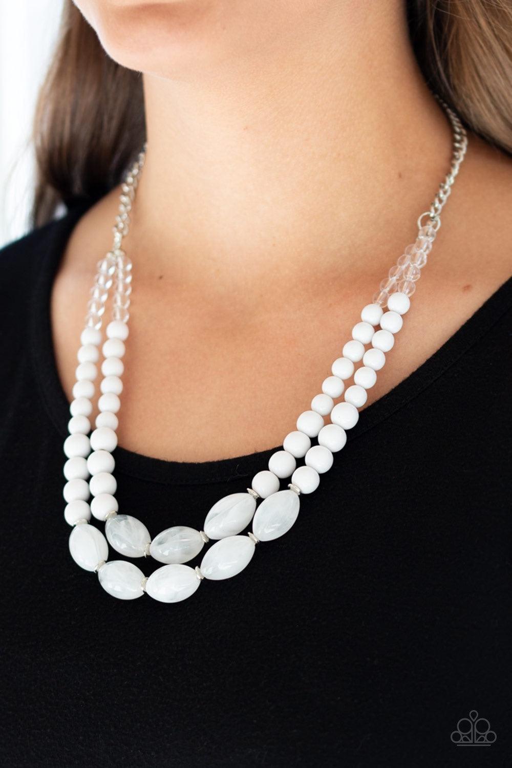 Paparazzi Accessories Sundae Shoppe - White A collection of glassy, polished, and cloudy white beads are threaded along two invisible wires below the collar for a beautiful pop of color. Features an adjustable clasp closure. Jewelry