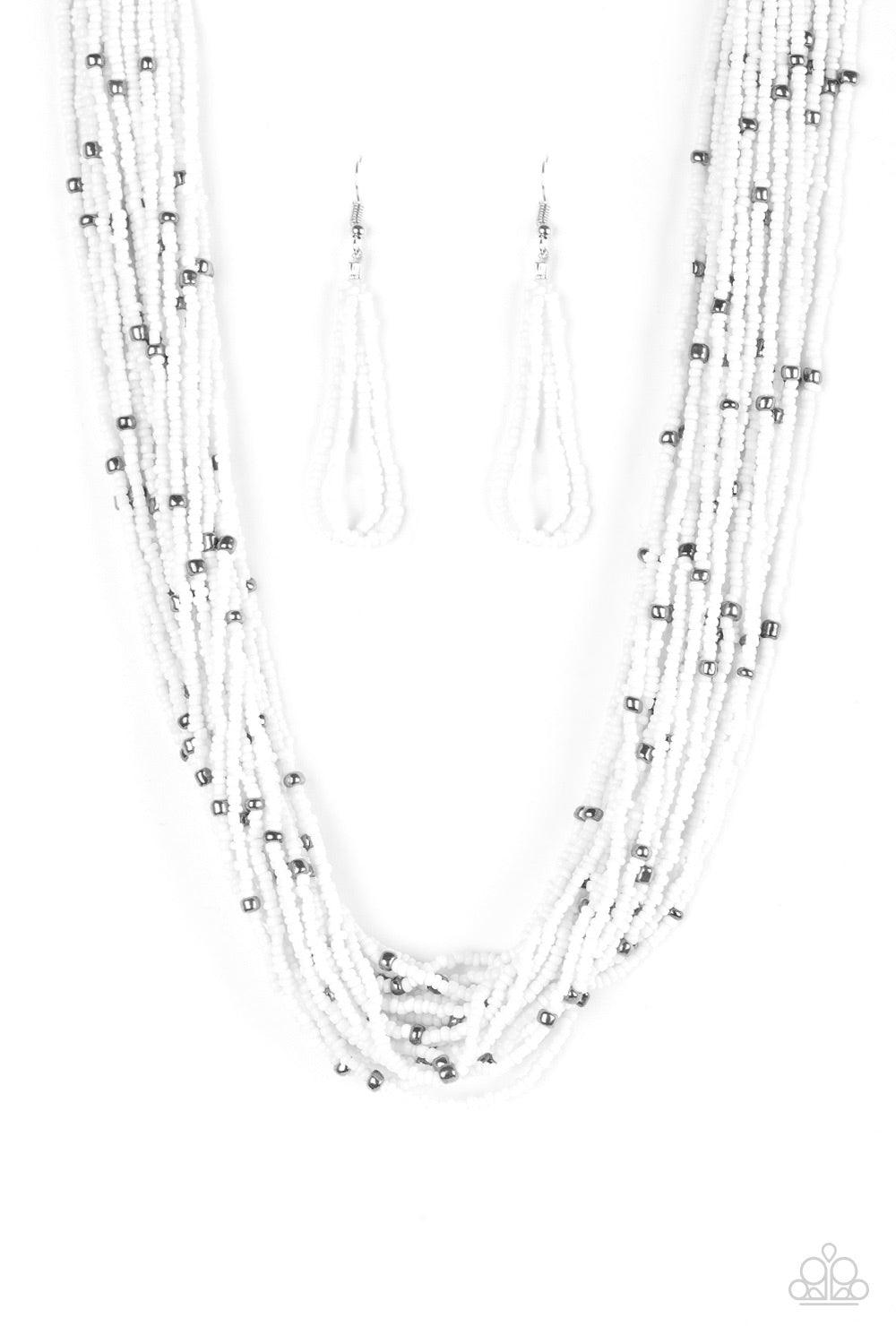 Paparazzi Accessories Summer Samba - White Countless white seed beads drape into a gorgeous layered cascade below the collar. Dainty metallic accents are sprinkled between the colorful beads, adding irresistible hints of shimmer to the seasonal palette. F