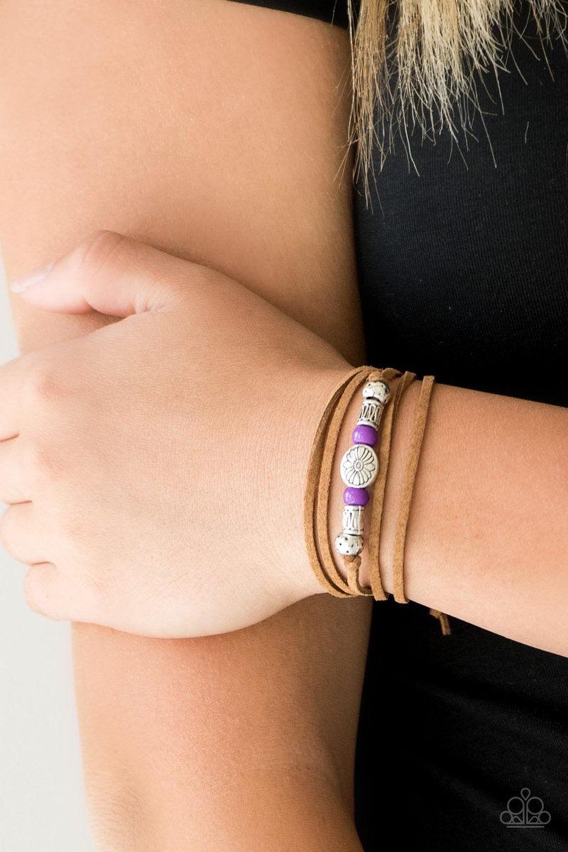 Paparazzi Accessories Clear A Path - Purple An array of purple and silver beads are knotted in place along elongated suede cording for a wanderlust fashion. To secure bracelet, tie ends in place around the wrist at desired length. Sold as one individual b