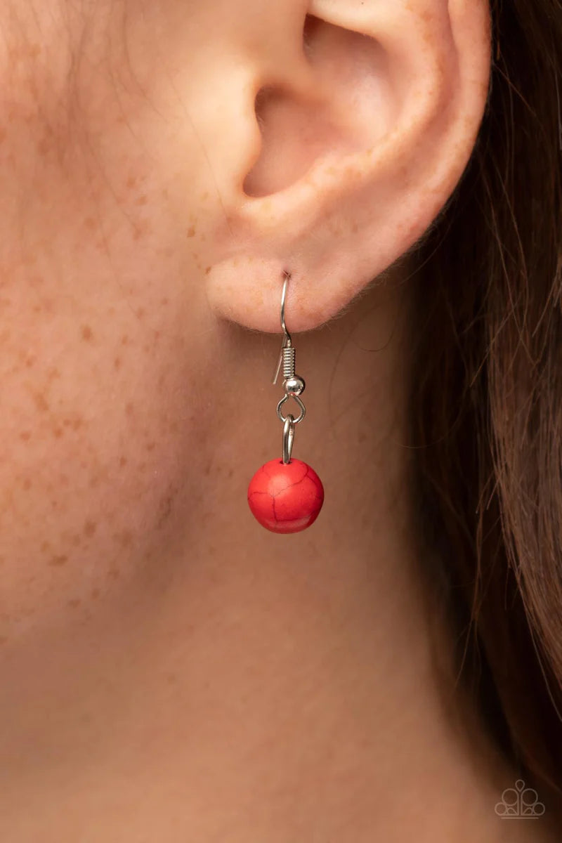 Paparazzi Accessories Southwest Paradise - Red A lengthened silver chain flows into a succession of polished red stone beads and silver accents. The flowy display gives way to an opulent red stone that is pressed into an ornate silver frame. Adorned with