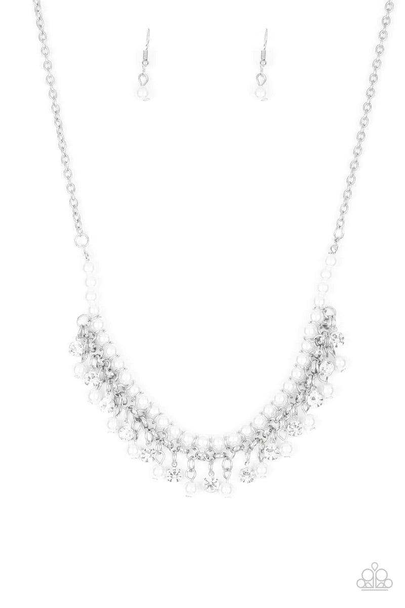 Paparazzi Accessories A Touch of Classy - White Infused with silver chain, classic white pearls are threaded along an invisible wire below the collar. Matching white pearls and glittery white rhinestones swing from the pearly strand, creating a flirtatiou
