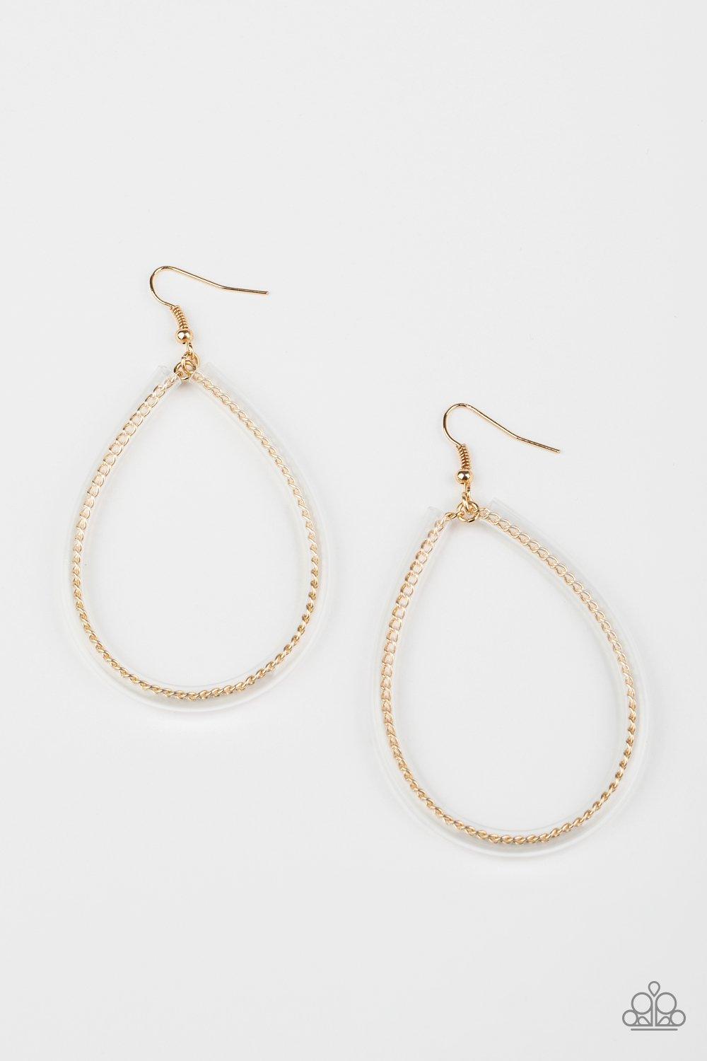 Paparazzi Accessories Just In Case You Missed It - Gold A dainty gold chain-like wire is threaded through the center of an invisible tube, creating an edgy teardrop. Earring attaches to a standard fishhook fitting. Sold as one pair of earrings. Jewelry
