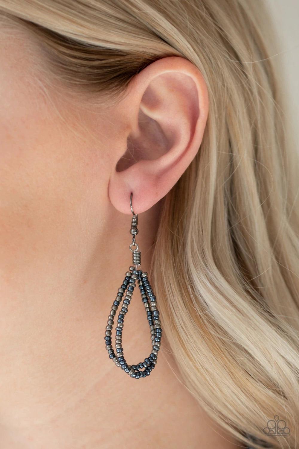 Paparazzi Accessories City Catwalk - Blue Brushed in a flashy metallic finish, countless strands of blue and gunmetal seed beads weave into a bulky square braid below the collar for a glamorous look. Features an adjustable clasp closure. Sold as one indiv