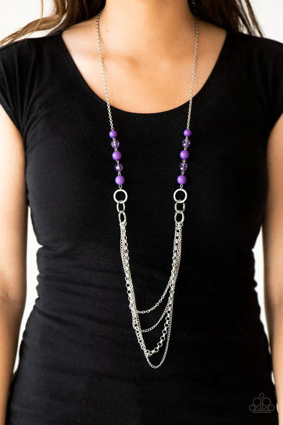 Paparazzi Accessories Vividly Vivid - Purple Polished purple, faceted crystal-like and delicately hammered silver hoops give way to mismatched silver chains down the chest for a whimsical look. Features an adjustable clasp closure. Sold as one individual