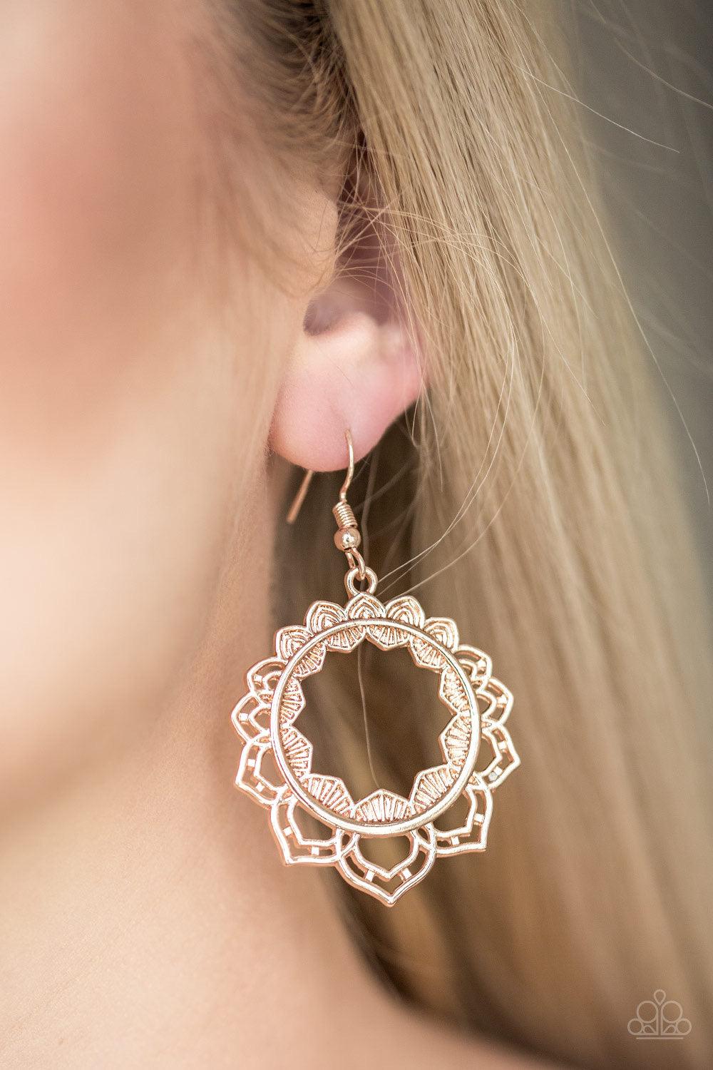 Paparazzi Accessories Modest Mandalas - Rose Gold Brushed in a high-sheen finish, shimmery rose gold petals bloom from an ornate rose gold hoop for a whimsical look. Earring attaches to a standard fishhook fitting. Jewelry