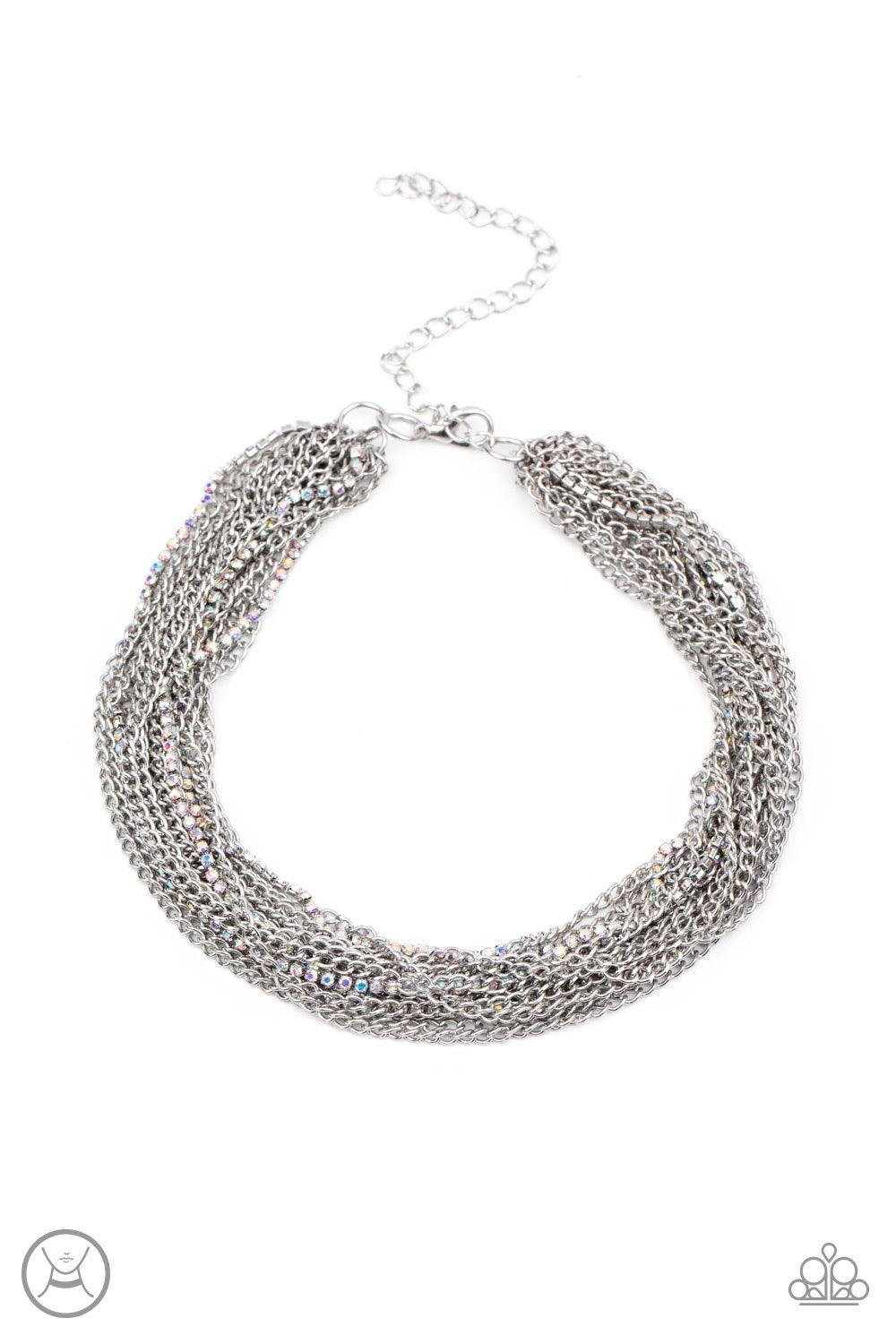 Paparazzi Accessories Catch You Layer! - Multi Hints of iridescent rhinestones peek out between layer after layer of glistening silver chains, creating a dramatic display around the neck. Features an adjustable clasp closure. Sold as one individual choker
