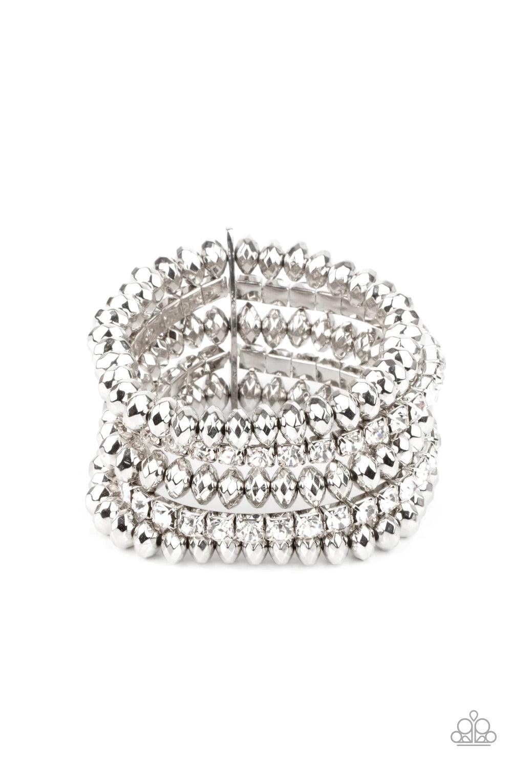 Paparazzi Accessories Best of Luxe - White Held together with a sleek silver fitting, edgy rows of faceted silver beads and glittery white rhinestones are threaded along stretchy bands around the wrist, creating glamorous layers. Sold as one individual br