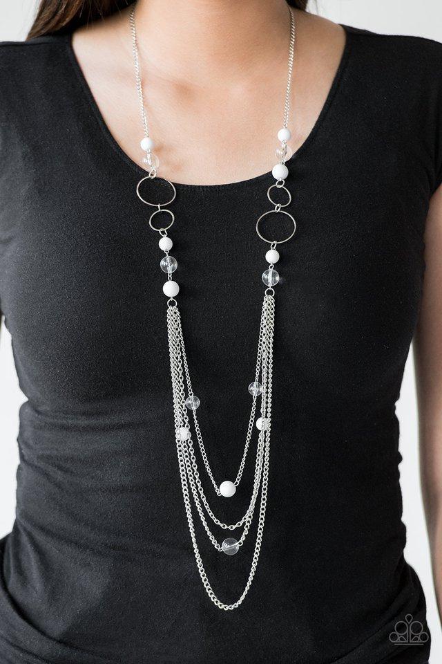 Paparazzi Accessories Bubbly Bright - White Infused with shimmery silver hoops, glassy and polished white beads trickle along glistening silver chains for a bubbly look. Features an adjustable clasp closure.Sold as one individual necklace. Includes one pa