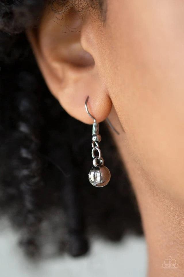 Paparazzi Accessories DIVA-de and Rule - Multi Gradually increasing in size, glistening gold and gunmetal beads swing from a net of interlocking gunmetal links. Shimmery gunmetal chains stream from the bottom of the beaded fringe for an edgy finish. Featu