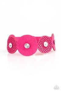 Paparazzi Accessories Poppin’ Popstar - Pink Dotted with white rhinestone centers, round pink suede frames join across the wrist for a whimsical look. Features an adjustable snap closure. Sold as one individual bracelet. Jewelry