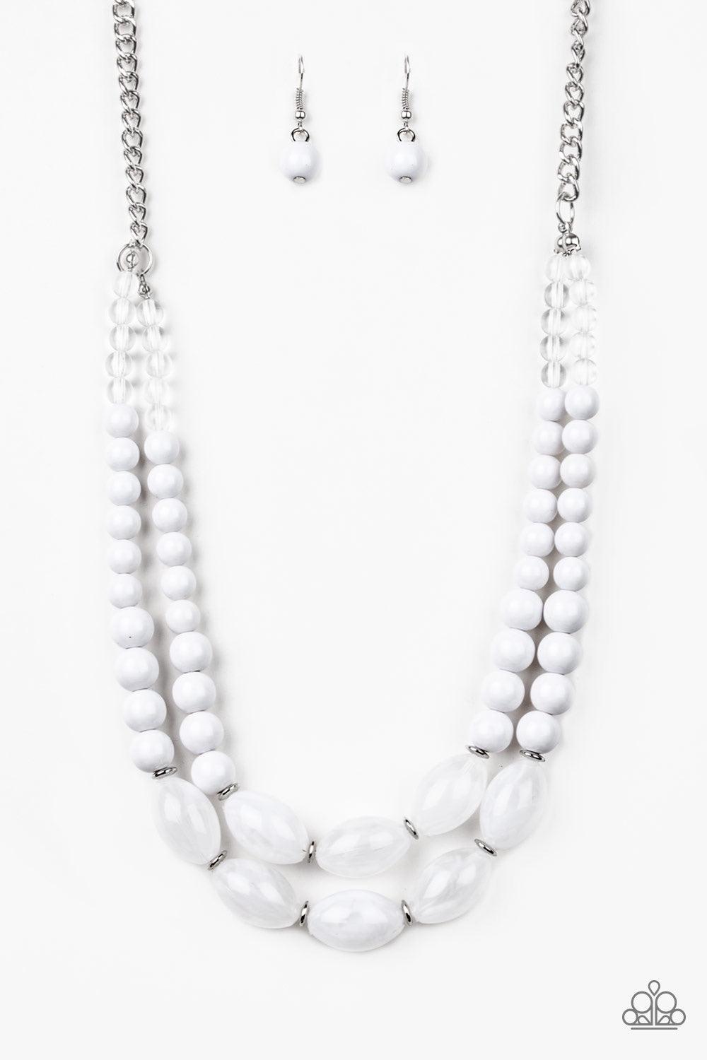 Paparazzi Accessories Sundae Shoppe - White A collection of glassy, polished, and cloudy white beads are threaded along two invisible wires below the collar for a beautiful pop of color. Features an adjustable clasp closure. Jewelry