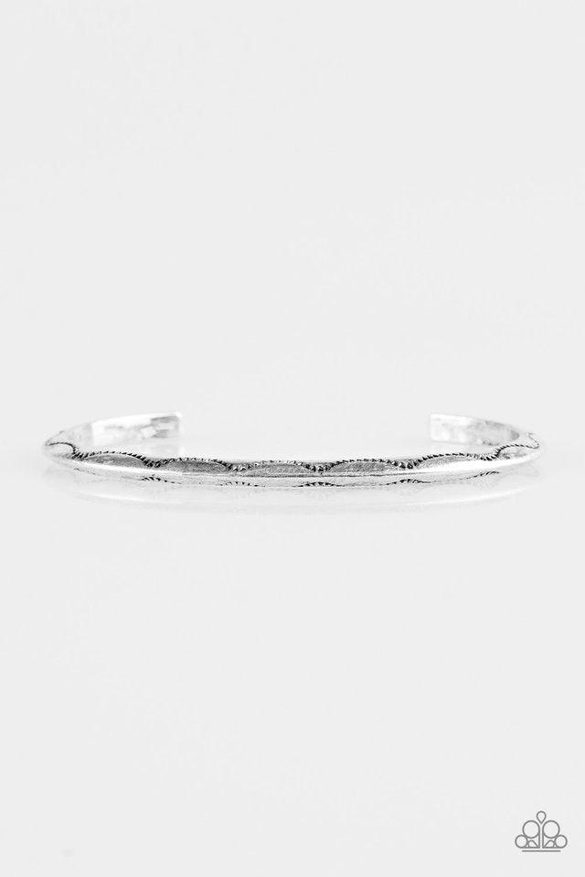 Paparazzi Accessories Desert Charmer - Silver Stamped in a scalloped pattern, a glistening silver cuff wraps around the wrist for a tribal inspired look. Sold as one individual bracelet. Jewelry