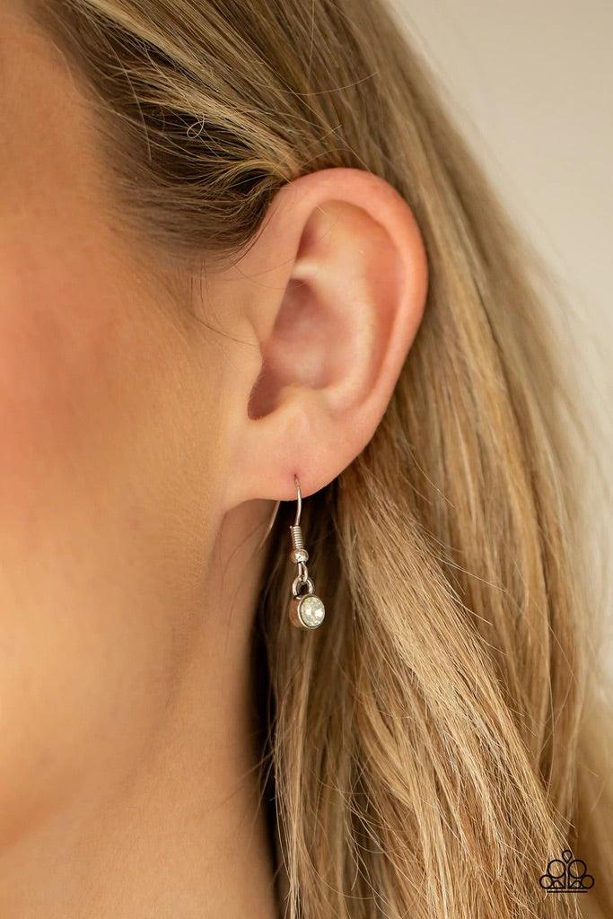 Paparazzi Accessories Opal Gardens - White Dotted in dainty opalescent beads, stacks of whimsical silver petals bloom from an opal beaded center, creating a decorative floral pendant at the bottom of a lengthened silver chain. Features an adjustable clasp