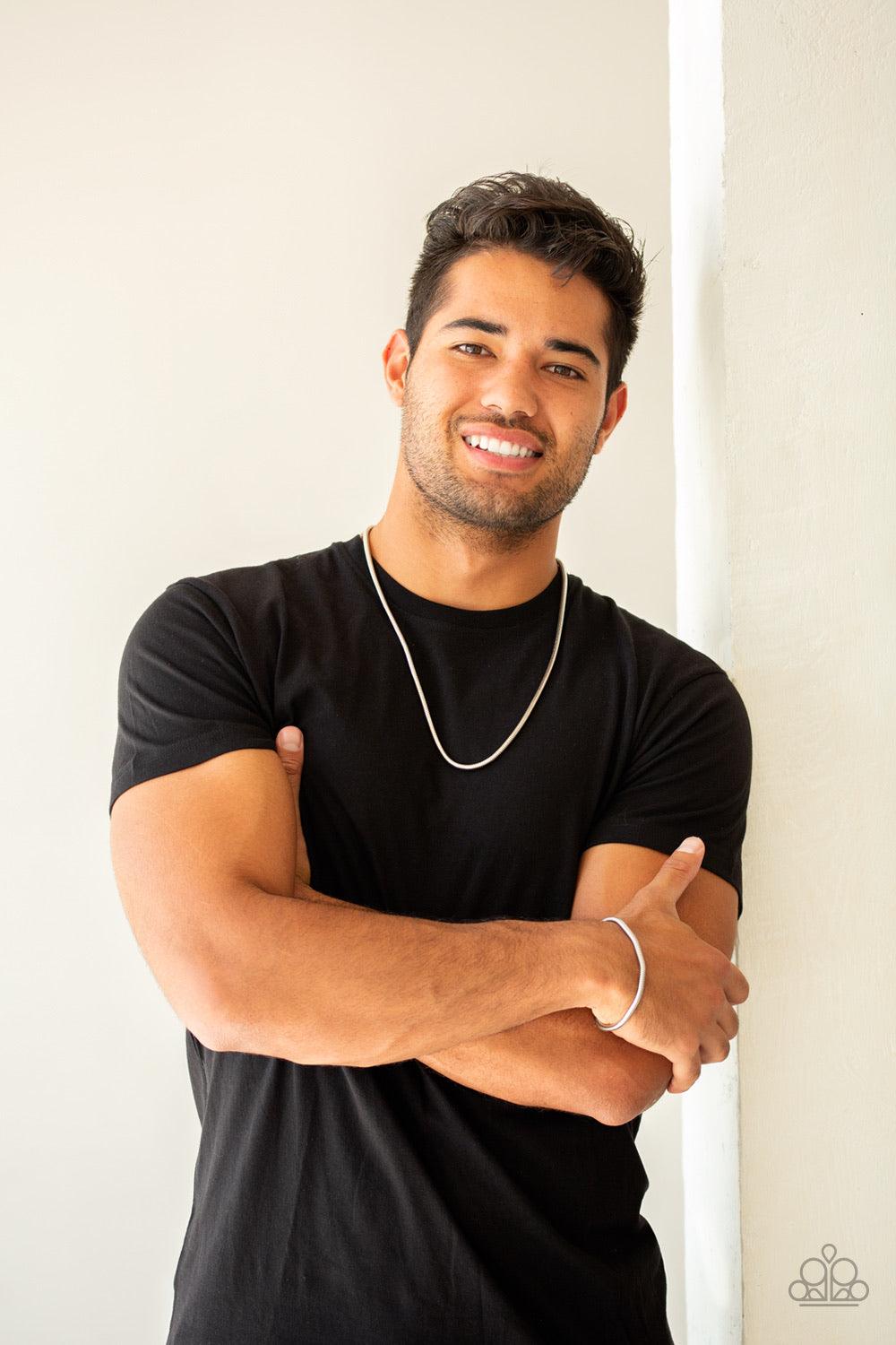 Paparazzi Accessories Victory Lap - Silver Brushed in a high-sheen shimmer, a rounded silver snake chain drapes across the chest for a sleek look. Features an adjustable clasp closure. Jewelry