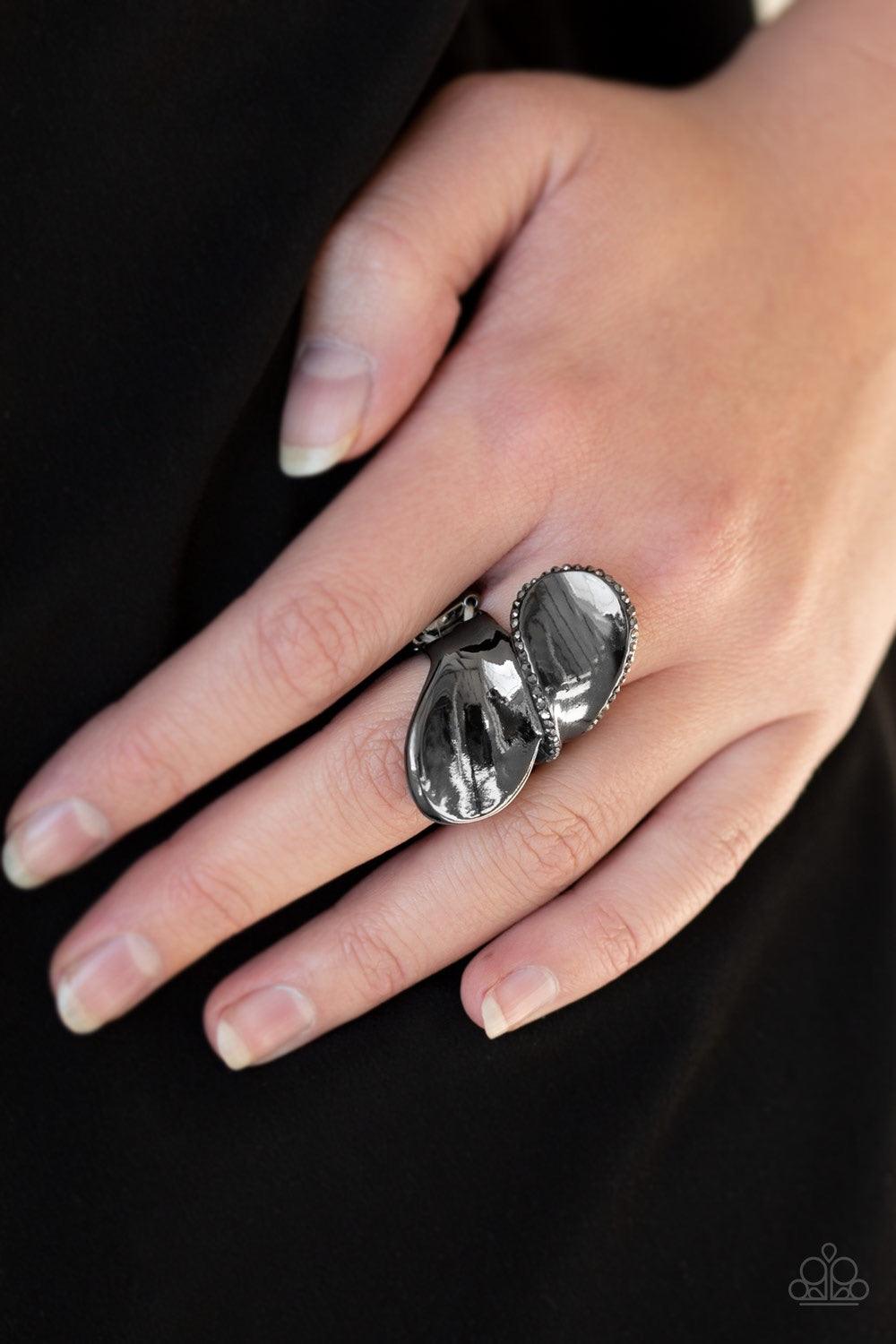 Paparazzi Accessories Fabulously Folded - Black Bordered in sections of glittery hematite rhinestones, glistening gunmetal frames fold across the finger for an edgy look. Features a stretchy band for a flexible fit. Jewelry