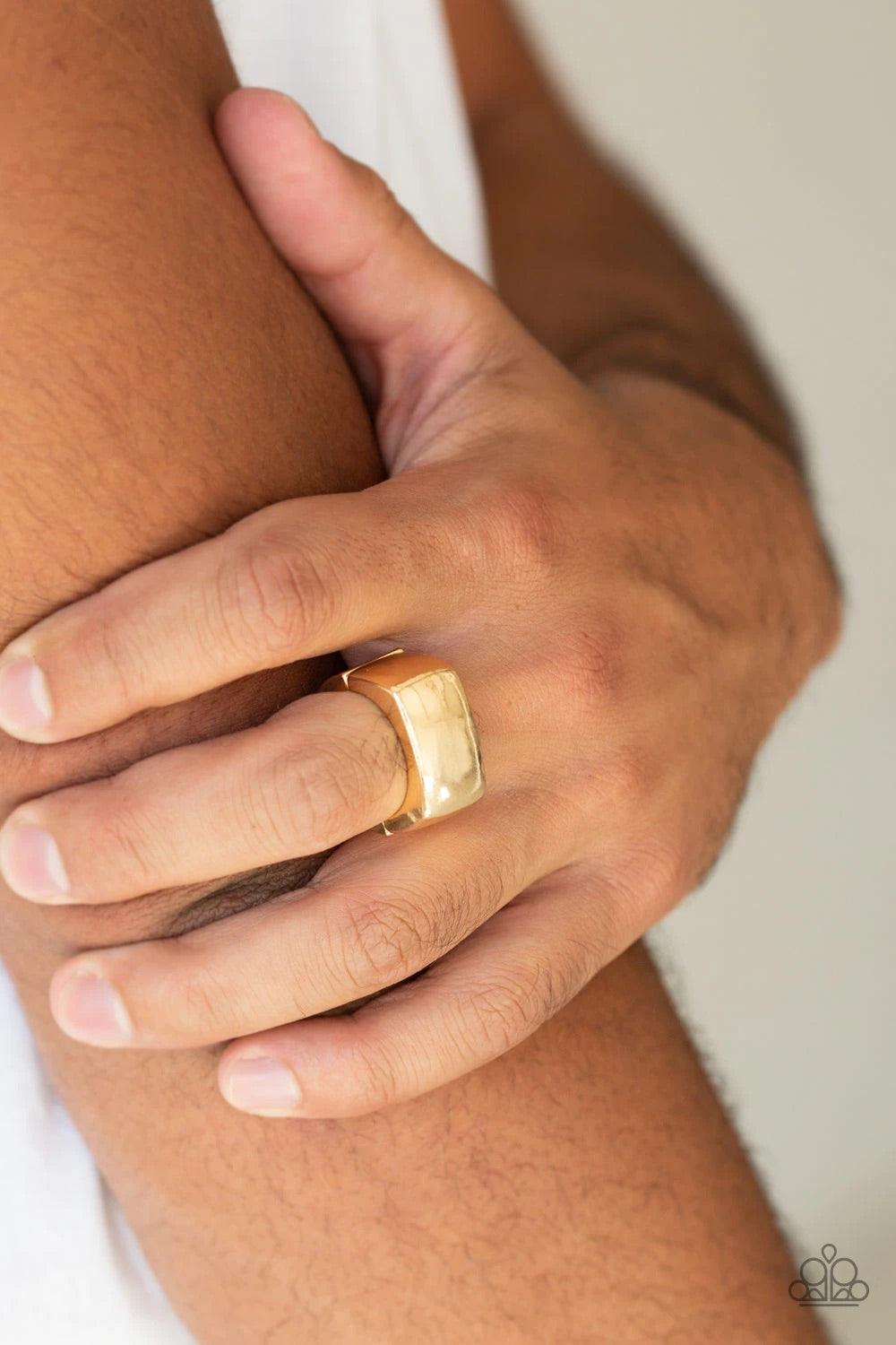 Paparazzi Accessories Straightforward - Gold Brushed in a high sheen finish, a reflective rectangular frame sits atop the finger for a sleek look. Features a stretchy band for a flexible fit. Sold as one individual ring. Jewelry