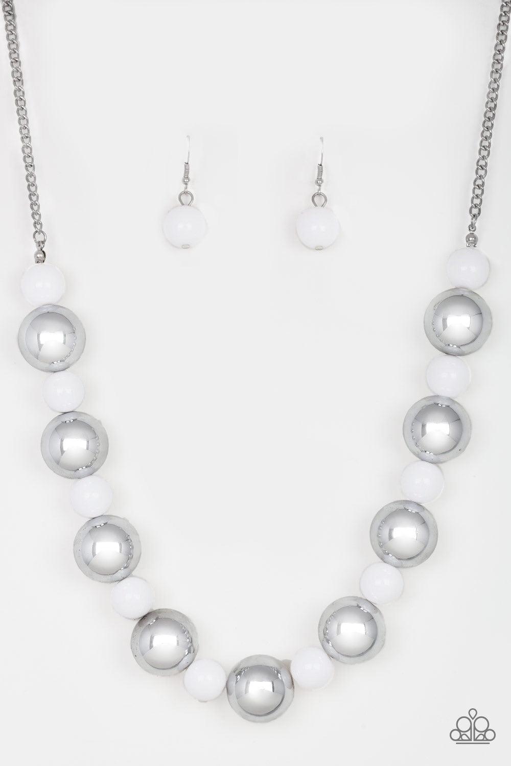 Paparazzi Accessories Top Pop - White Polished white beads and dramatic silver beads drape below the collar for a perfect pop of color. Features an adjustable clasp closure. Jewelry