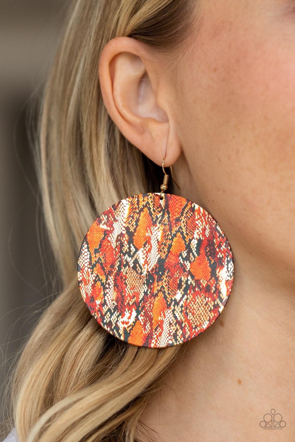 Paparazzi Accessories I’m Only Animal - Multi Featuring a colorful python print on the front and back, an oversized gold disc swings from the ear for a wild look. Earring attaches to a standard fishhook fitting. Sold as one pair of earrings. Jewelry