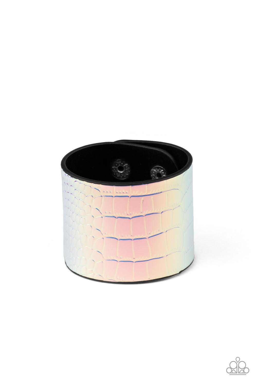 Paparazzi Accessories Chroma Croc - Multi Featuring a rainbow chrome-like finish, a croc patterned leather band curls around the wrist for a statement-making look. Features an adjustable snap closure. Jewelry