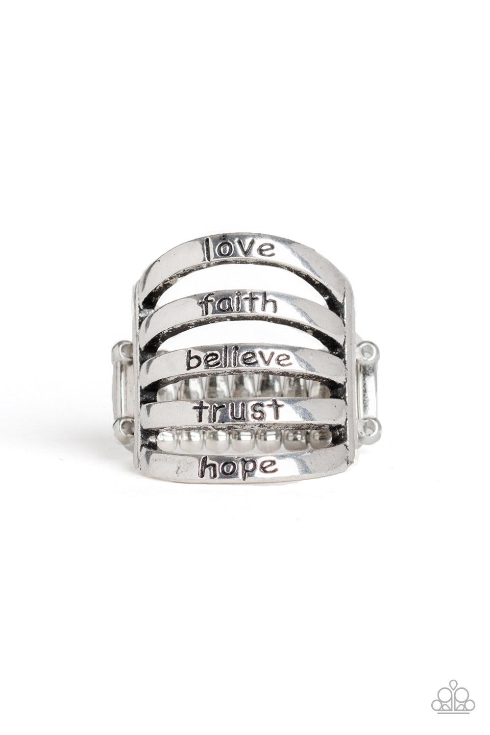 Paparazzi Accessories Never Lose Faith - Silver Stamped in the words, "love", "faith", "believe", "trust", and "hope", shimmery silver bands layer across the finger for a motivational look. Features a stretchy band for a flexible fit. Jewelry