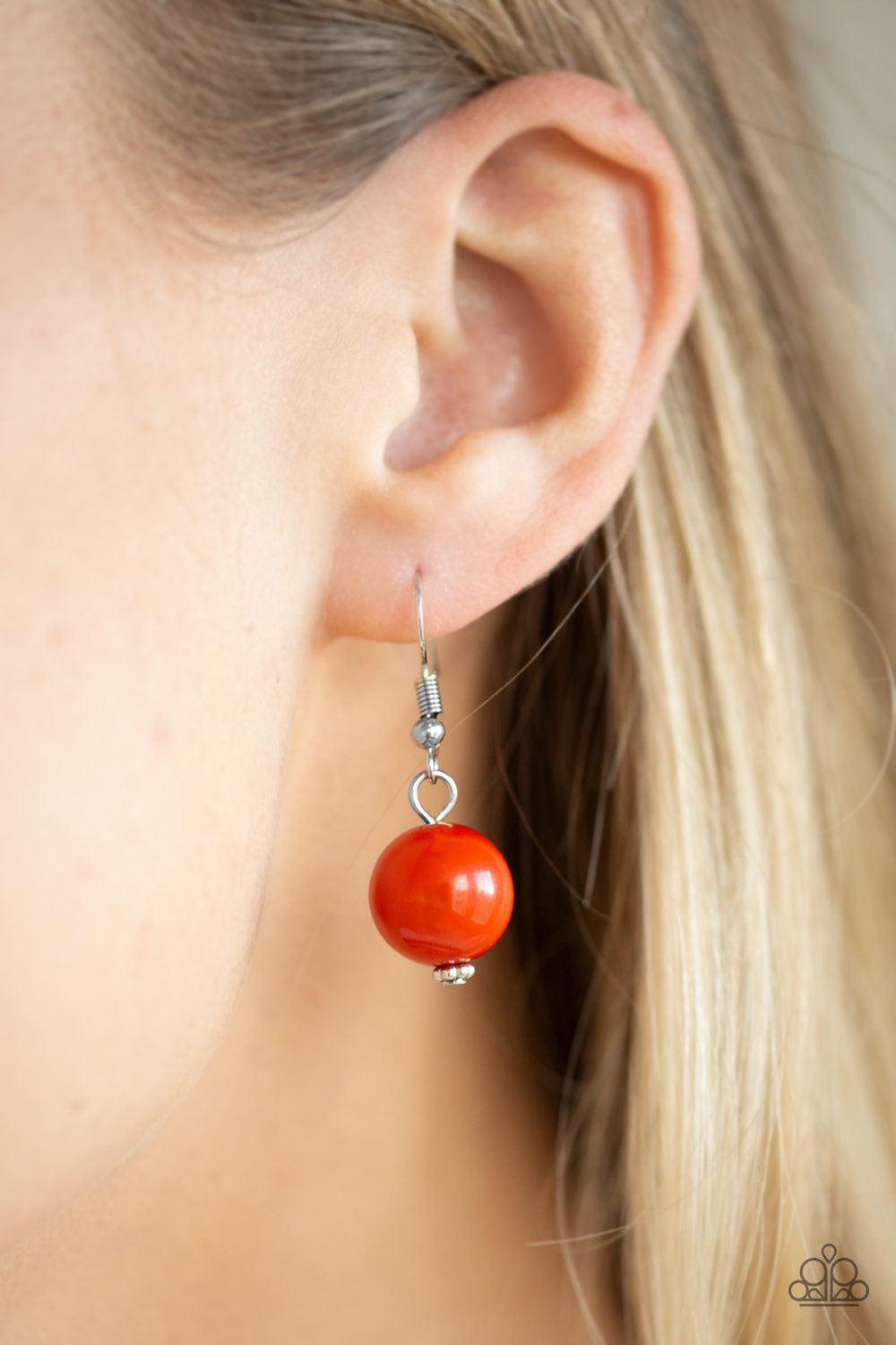 Paparazzi Accessories Gorgeously Globetrotter - Orange Varying in shape and shimmer, smooth and faceted Burnt Orange beads trickle from doubled silver chain links, creating a colorful fringe below the collar. Features an adjustable clasp closure. Jewelry