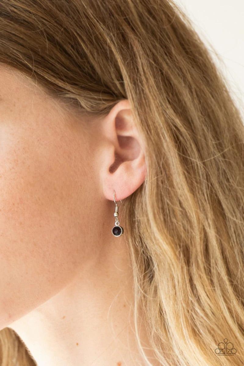 Paparazzi Accessories Chicly Centered - Purple Brushed in a gritty antiqued finish, a rippling silver frame flares from a purple rhinestone encrusted center for an edgy look. Features an adjustable clasp closure. Jewelry