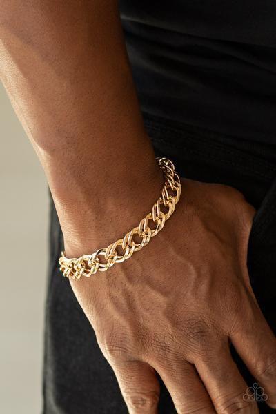 Paparazzi Accessories On The Ropes - Gold Featuring double links, a glistening gold chain wraps around the wrist for a casual look. Features an adjustable clasp closure. Jewelry