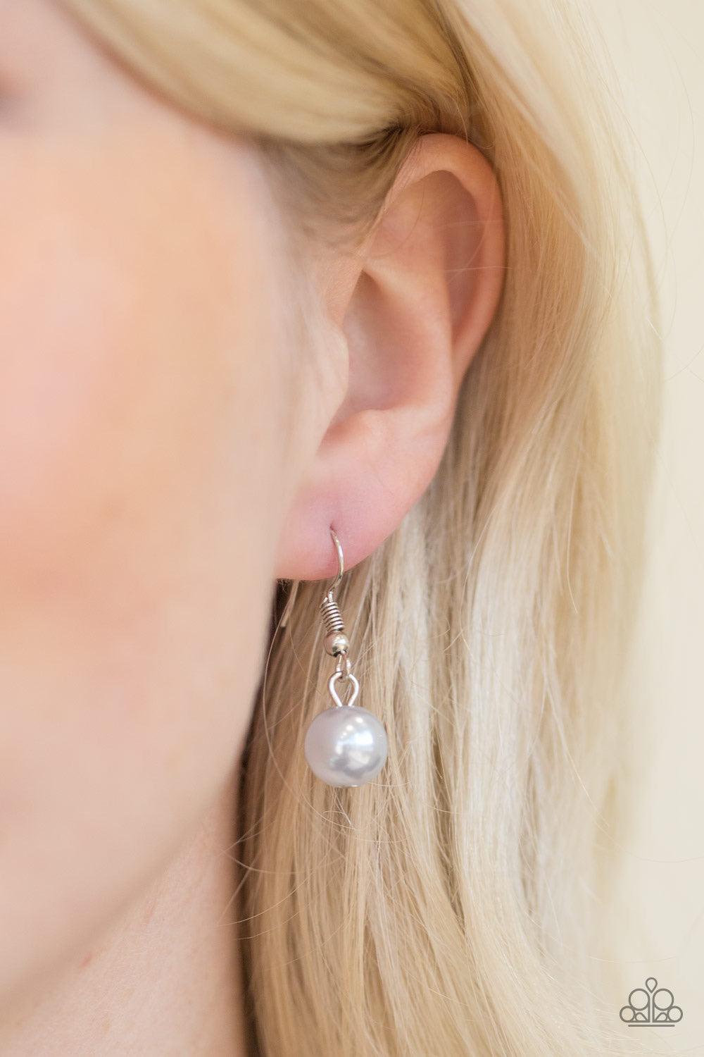 Paparazzi Accessories STUN Control - Silver Pearly silver beads trickle along strands of glistening silver chains, creating a tapered fringe below the collar. Features an adjustable clasp closure. Sold as one individual necklace. Includes one pair of matc